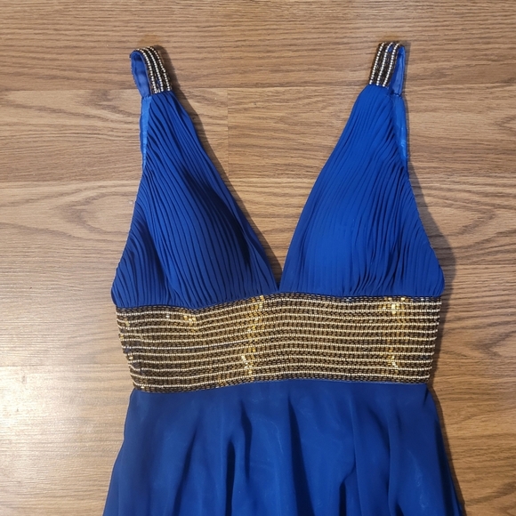 Elegant Blue Evening Gown with Gold Beading by Scala - Picture 11 of 16
